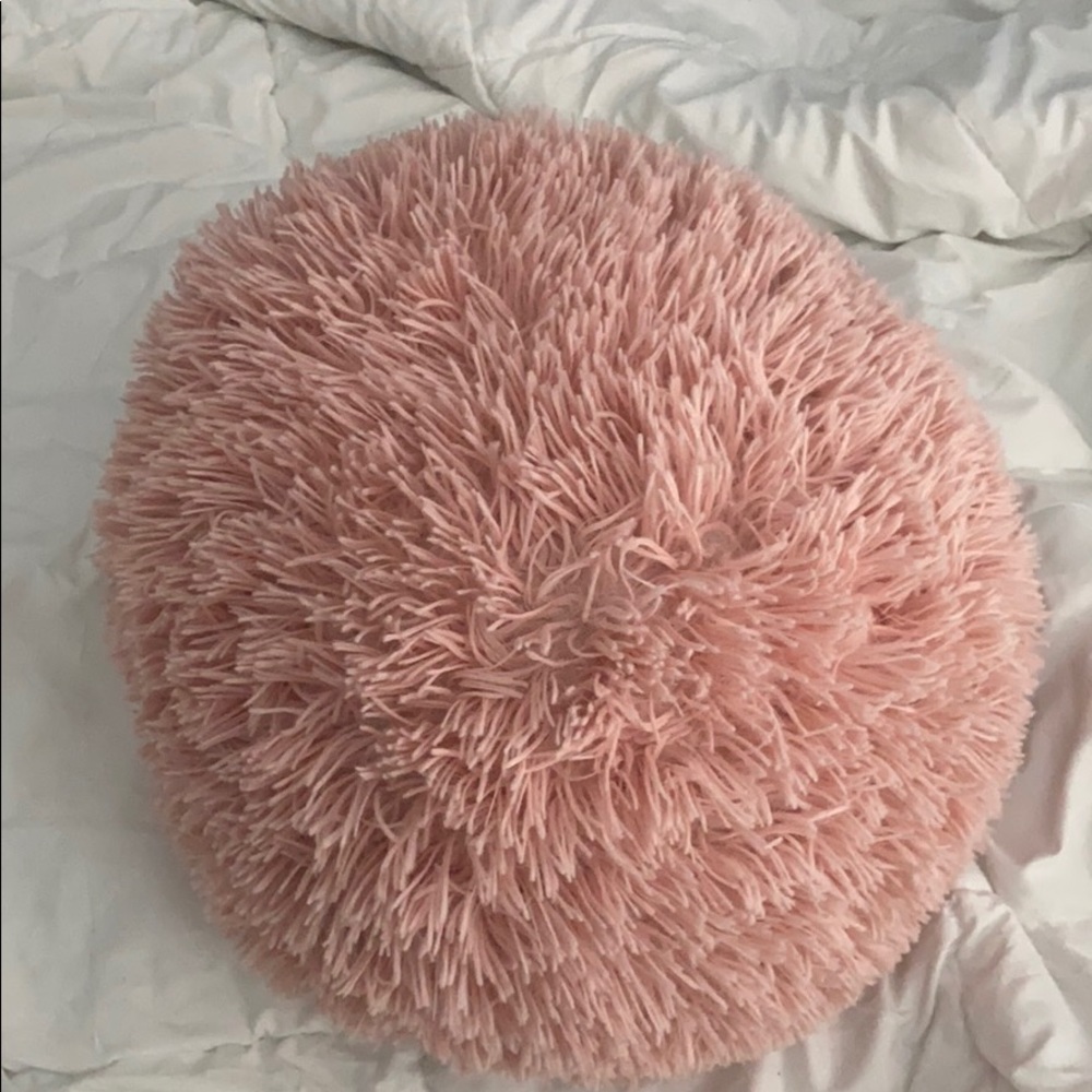 Light pink fluffy pillow
